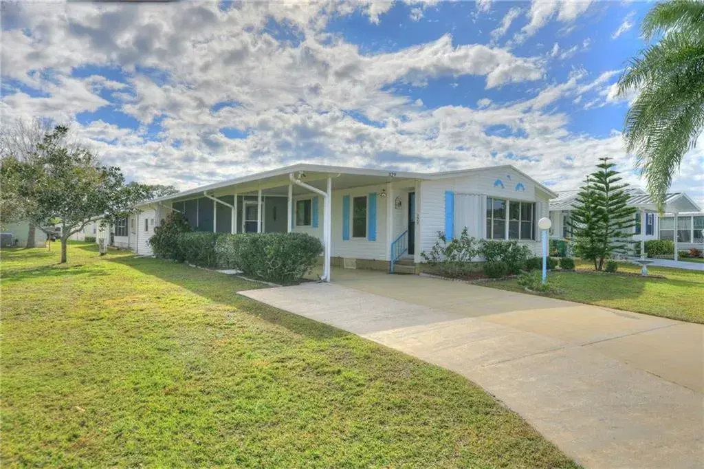 Picture of 329 Macadamia Drive, Barefoot Bay, FL 32976