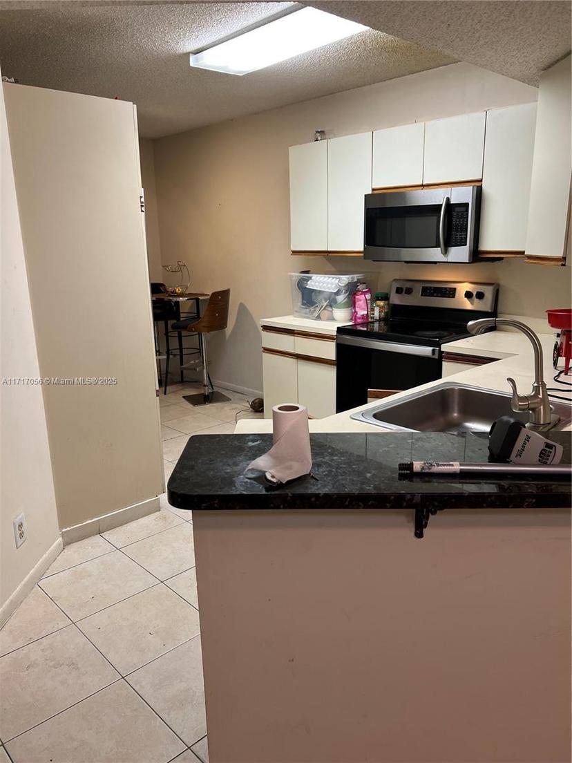 Picture of 8871 Wiles Rd # 208, Coral Springs FL 33067