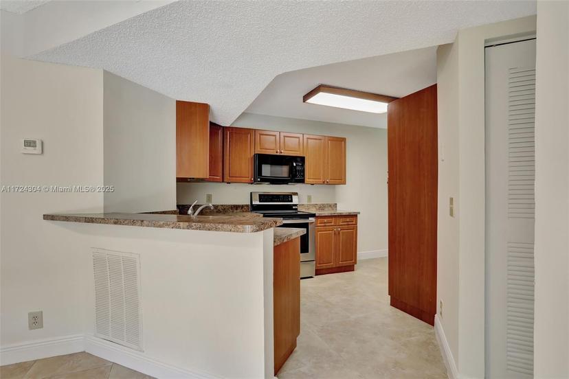 Picture of 8891 Wiles Rd # 102, Coral Springs FL 33067