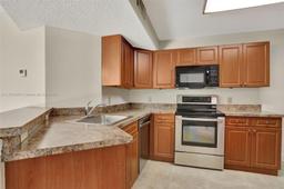 Picture of 8891 Wiles Rd # 102, Coral Springs, FL 33067