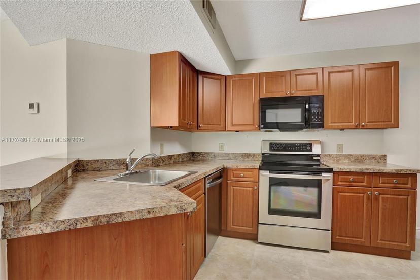 Picture of 8891 Wiles Rd # 102, Coral Springs FL 33067