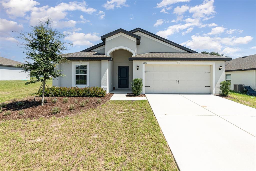 Picture of 1690 Hideaway Flat Street, Mascotte, FL 34753