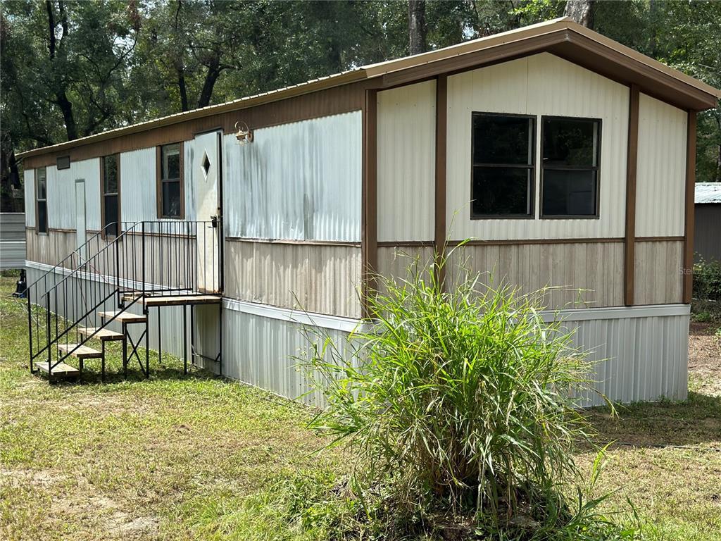 Picture of 7809 SW 12Th Place, Bell, FL 32619