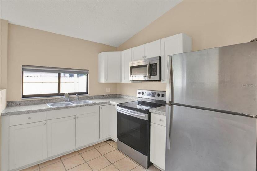 Picture of 11408 Midfield Way Unit 11408, Tampa FL 33624