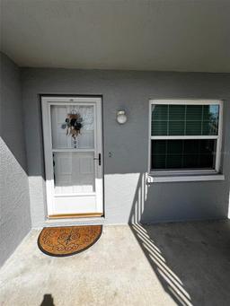 Picture of 12027 Hoosier Court Unit 104, Hudson, FL 34667